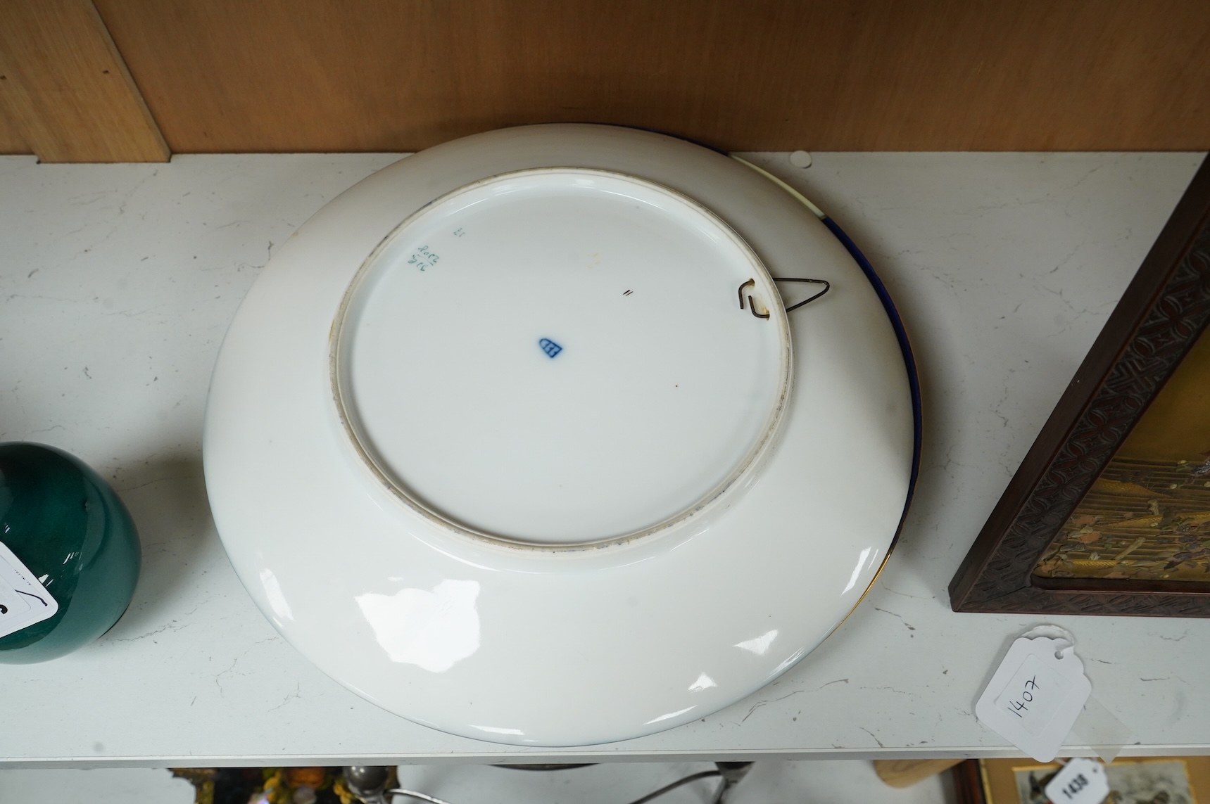 A pair of Vienna style porcelain chargers, early 20th century, 33cm